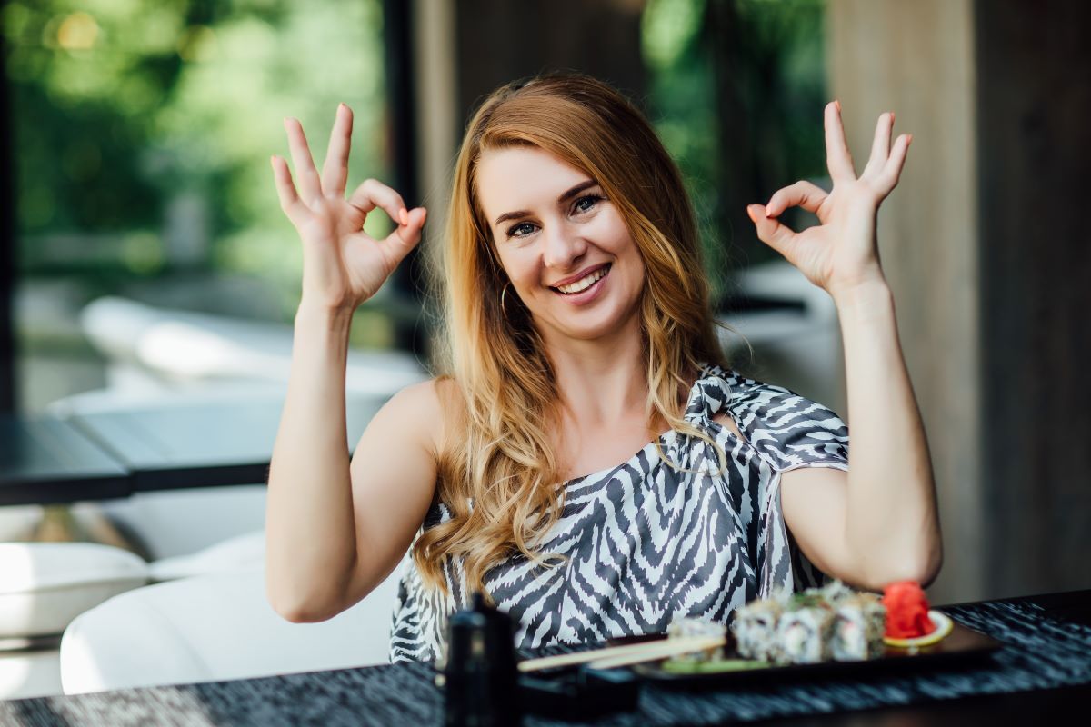 blonde woman have sushi time restaurant