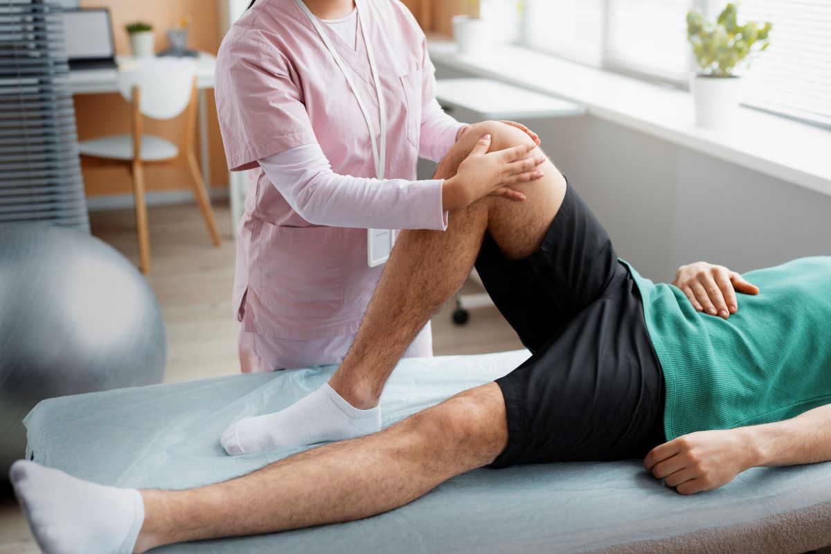 doctor helping patient rehabilitation